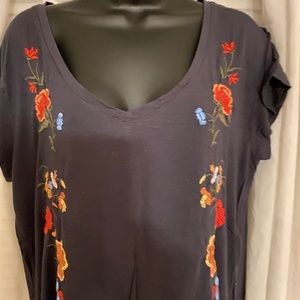 Black T-shirt with lovely inquiry on it flowers